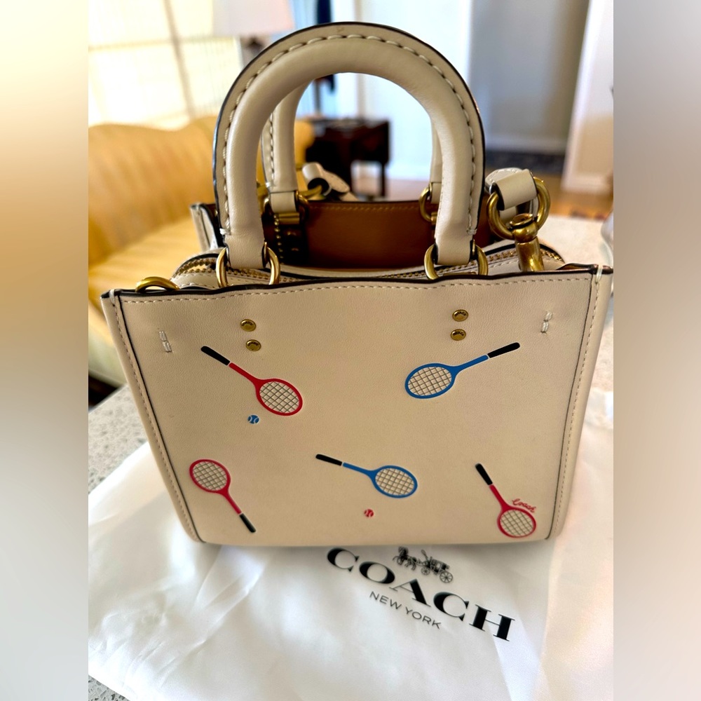 Coach tan leather purse with tennis racquets